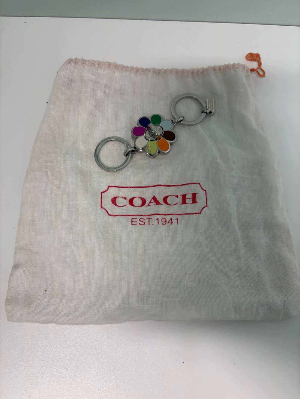 NWOT Coach Daisy Legacy Turnlock Charm